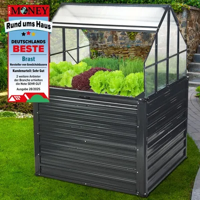 A raised garden bed with a greenhouse top, filled with various plants, set in a garden environment.