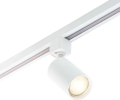 A close-up shot of a white track light system with a single spotlight attached.