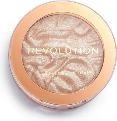 A close-up, top-down view of a single makeup highlighter compact.