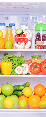 Produktbild von Wallario Poster - Offener gefüllter Kühlschrank, Kunstdruck Größe: 50 x 125 cm