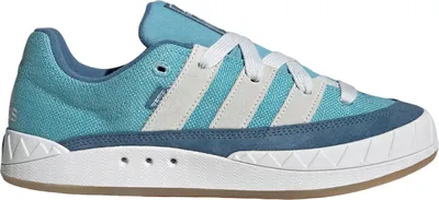 A side view of an Adidas sneaker.
