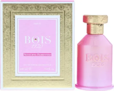 A perfume box and bottle are displayed side-by-side against a white background.