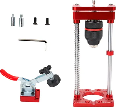 A collection of tools for woodworking projects, including a drill press guide and a clamp.