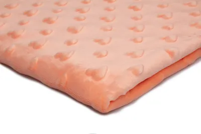 Produktbild von Minkee Fleece Knit mit Herzprägung Papaya 50 x 155 cm