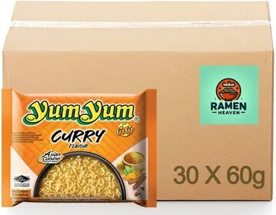 A cardboard box with a package of Yum Yum Curry flavor instant noodles in front of it.