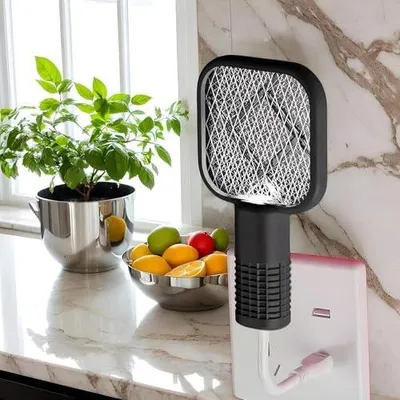 Obrázek produktu pro Elektrický odpuzovač much s ochrannou mřížkou a sítí, vhodný pro použití v domácnosti, zahradě a při kempování