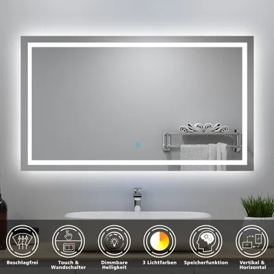A bathroom mirror with integrated LED lighting, mounted above a sink and countertop. The mirror has a sleek, modern design with a thin frame and a soft, diffused light emanating from its edges. Below the mirror, there are icons representing product feature