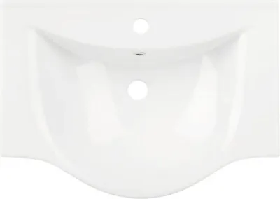 A top-down view of a white ceramic sink.