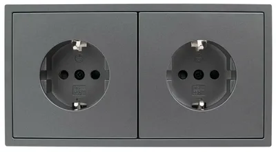 A close-up studio shot of a double electrical outlet.