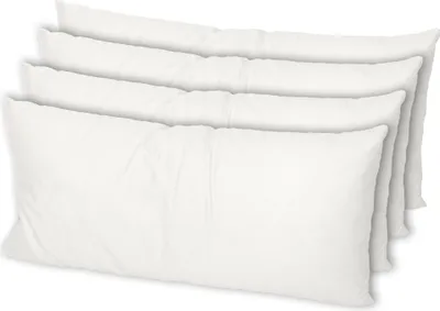 Four white pillows are stacked diagonally on a white background.