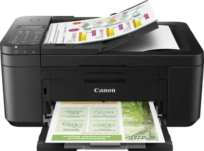 A black Canon PIXMA TR4650 Multifunktionsdrucker is shown from the front, with printed documents in the input and output trays.