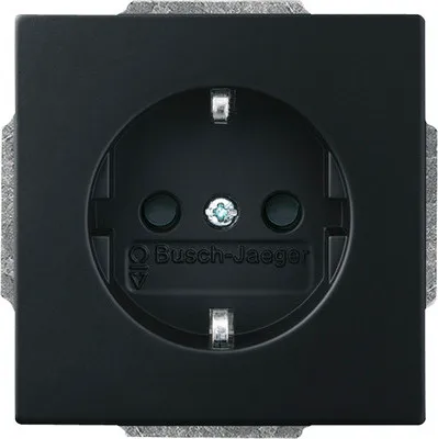 A close-up studio shot of a black electrical outlet.