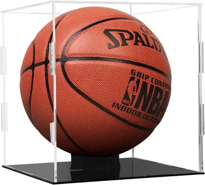 A basketball inside a clear acrylic display case with a black base.