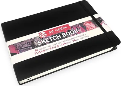 A black sketchbook with a white band of text and graphics around it, placed on a white background.