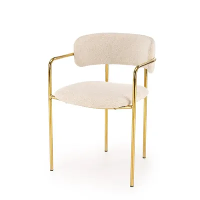 A beige upholstered chair with gold metal legs is shown against a white background.