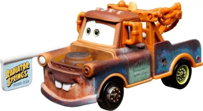 A toy tow truck, Mater from Disney Cars, with a sign.