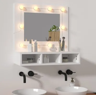 A modern bathroom vanity setup with a lighted mirror and double sinks.
