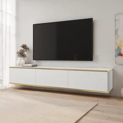 A modern living room with a wall-mounted TV and media console.