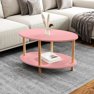 A pink oval coffee table with a wooden frame is placed on a gray rug in front of a sectional sofa.