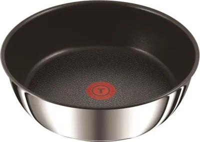 A close-up studio shot of a TEFAL frying pan.
