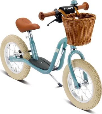 A Puky balance bike is shown against a white background.