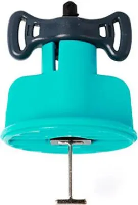 A close-up studio shot of a tile leveling system tool.
