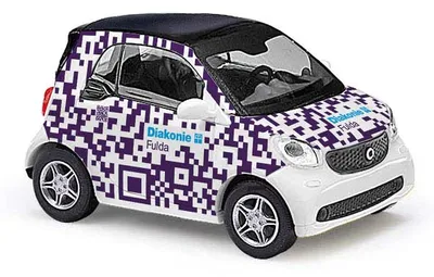 Produktbild von Busch Automodelle 50723 - Smart Fortwo Coupé "Diakonie Fulda" 1:87