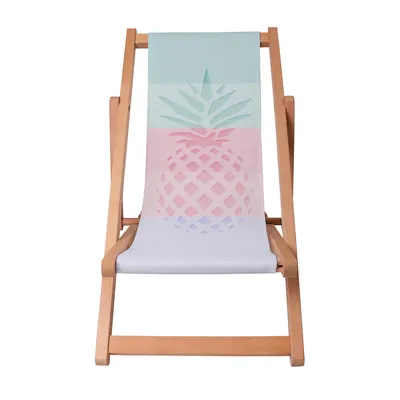 A front view of a wooden beach chair with a pineapple pattern on the fabric.