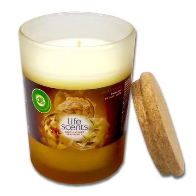A scented candle with a cork lid.