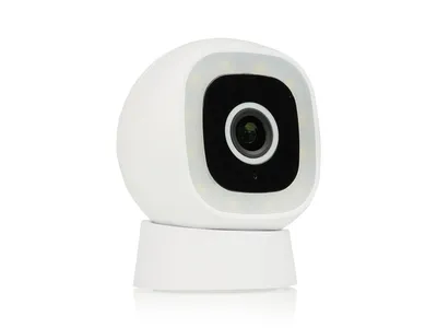 A white smart camera with a black lens and a ring of lights around it, set against a white background.