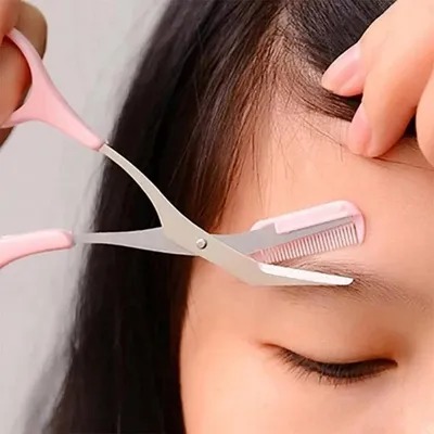 Imagen del producto de Tijeras compactas de acero inoxidable, ideales para el cuidado y el diseño de las cejas