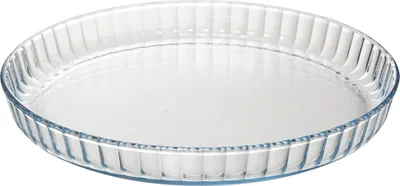 A clear, studio shot of a glass pie dish on a white background.