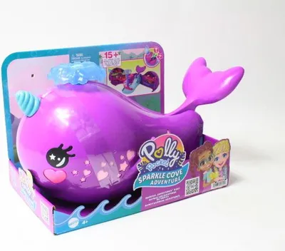 A toy narwhal boat in its packaging.