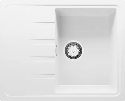 A white kitchen sink with a single basin and a drainboard.