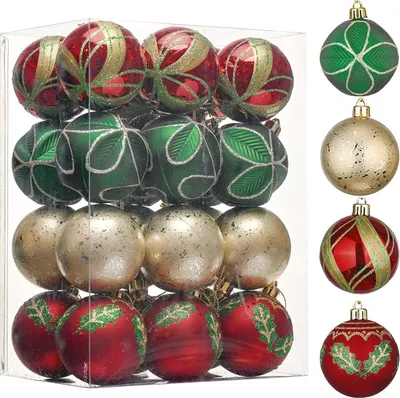 A collection of Christmas ornaments in a clear box, with additional ornaments displayed to the right.