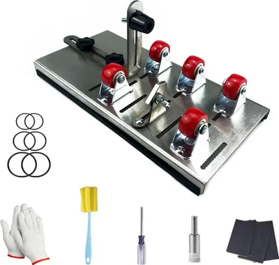 A product shot of a glass bottle cutter and its accessories on a white background.