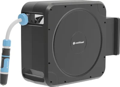 A black automatic hose reel mounted on a wall, with a white hose and blue connector attached.