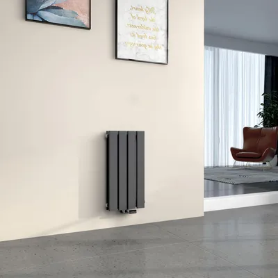 A modern living room with a radiator on the wall and a chair in the background.