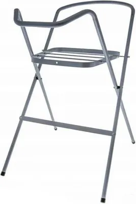 A gray metal bathtub holder stand.