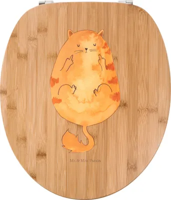 A toilet seat with a printed design of a cartoon cat.