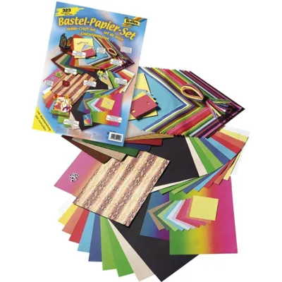 A collection of colorful craft paper and a booklet for a craft set.