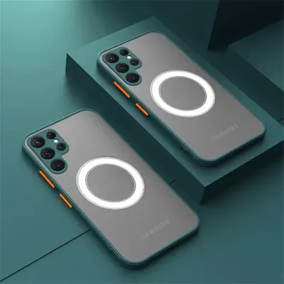 Two phone cases with magnetic rings are displayed on teal geometric stands.