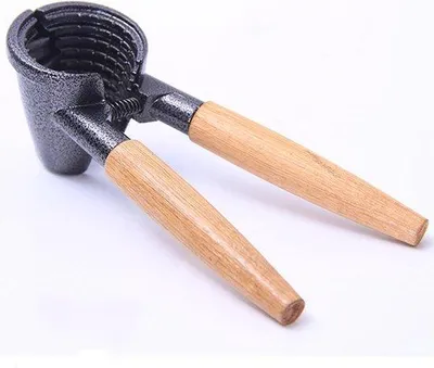 Produktbild von Famanu Nussknacker Metall - Mit Antirutsch Holzgriff für Walnüsse, Haselnüsse, Pekannüsse und Mandeln