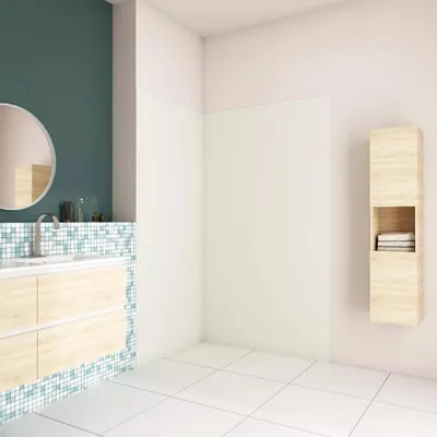 A modern bathroom with a vanity, sink, mirror, and a tall cabinet.