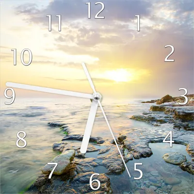 Produktbild von Wallario Design Wanduhr Sonnenuntergang über dem Meer aus Echtglas, Größe 20 x 20 cm