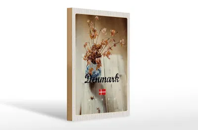 Produktbild von Holzschild Reise 20x30cm Dänemark verwelkte Blumen in Vase