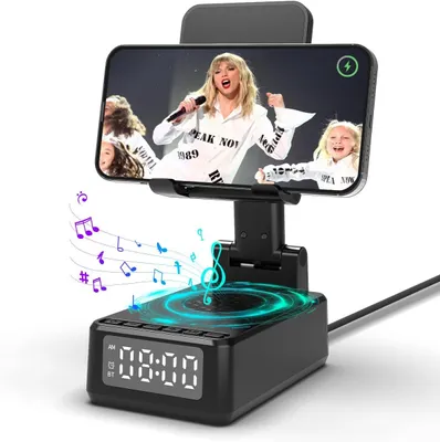 Produktbild von Bluetooth Lautsprecher mit Faltbarer Handyhalterung, 6-in-1 Tragbarer Musikbox, Handy Ständer mit Wecker Digital Uhr Wireless Charger