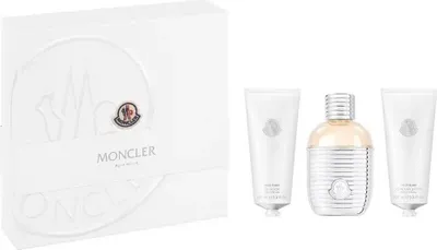 A white gift box containing Moncler fragrance products.