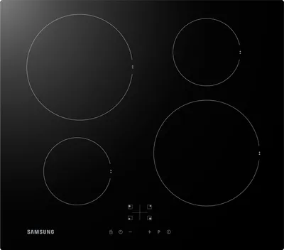 A top-down view of a black induction cooktop with four heating elements.