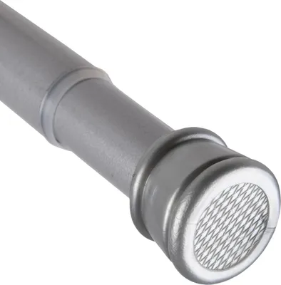 Close-up of the end of a metal rod with a mesh-like pattern.